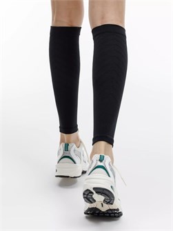 {{photo.Alt || photo.Description || 'Гетры спортивные Veloxi, черные'}}