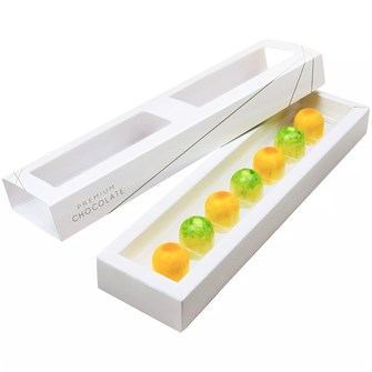 {{photo.Alt || photo.Description || 'Набор конфет ручной работы «Маракуйя»'}}