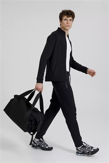 {{photo.Alt || photo.Description || 'Дорожная сумка Traffic, черная'}}